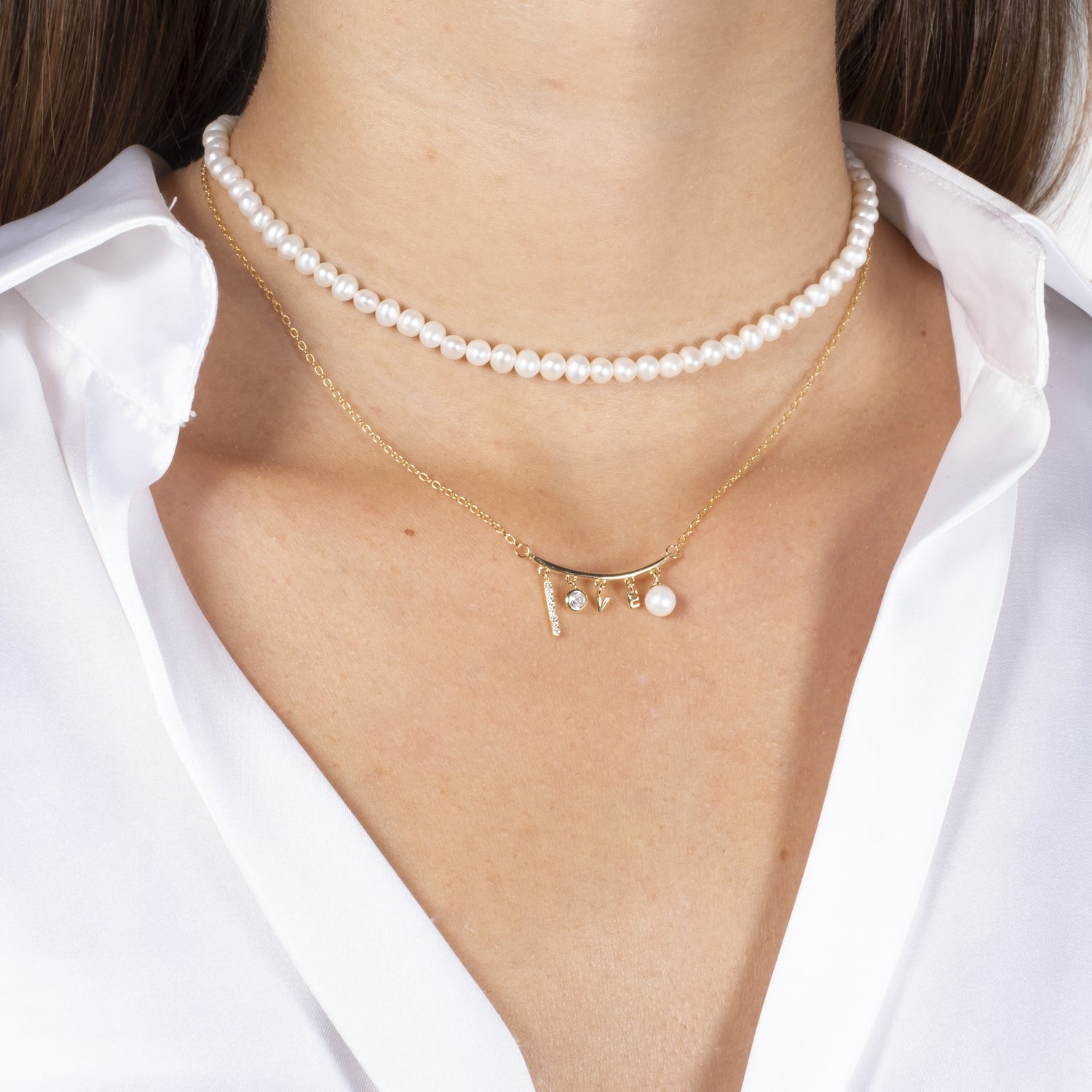 argento 925 placcato oro18k con targhetta e scritta love con zirconi incastonati e perla coltivata in acqua dolce Fofo Somani